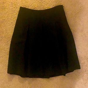 Black pleated a-line skirt from WHBM